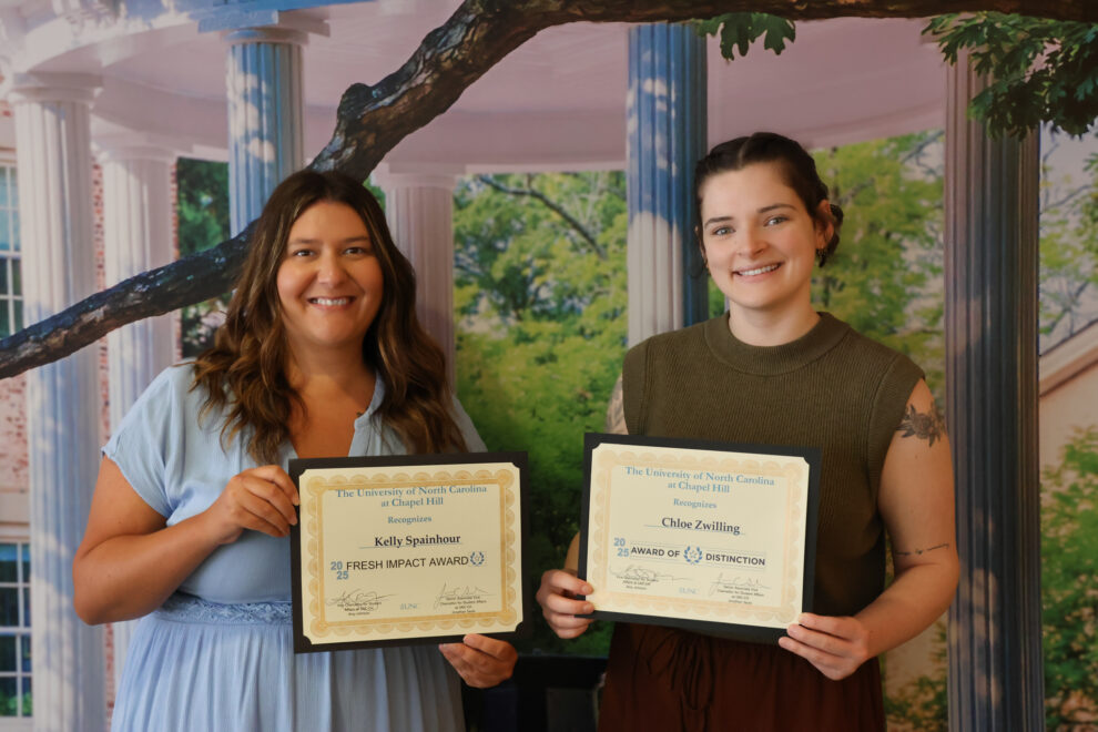 Kelly Spainhour (left) holding the Fresh Impact Award and Chloe Zwilling (right) holding the Award of Distinction.
