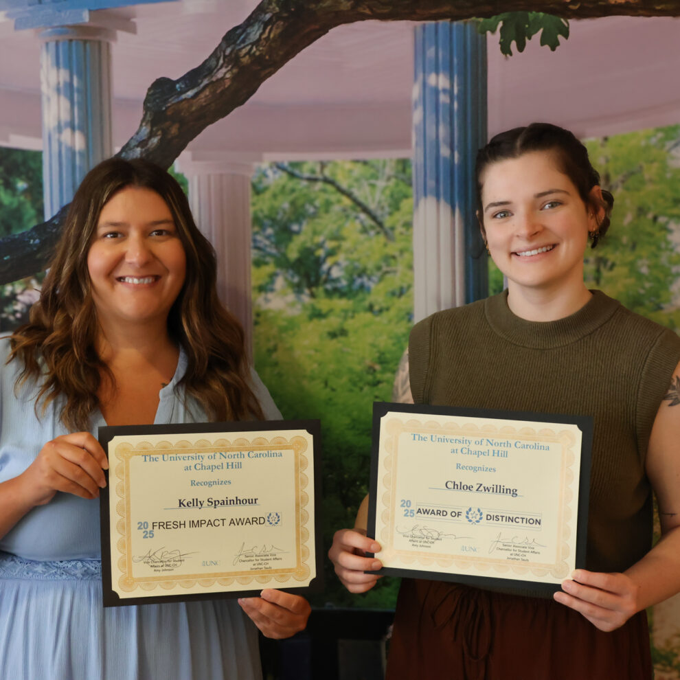 Kelly Spainhour (left) holding the Fresh Impact Award and Chloe Zwilling (right) holding the Award of Distinction.