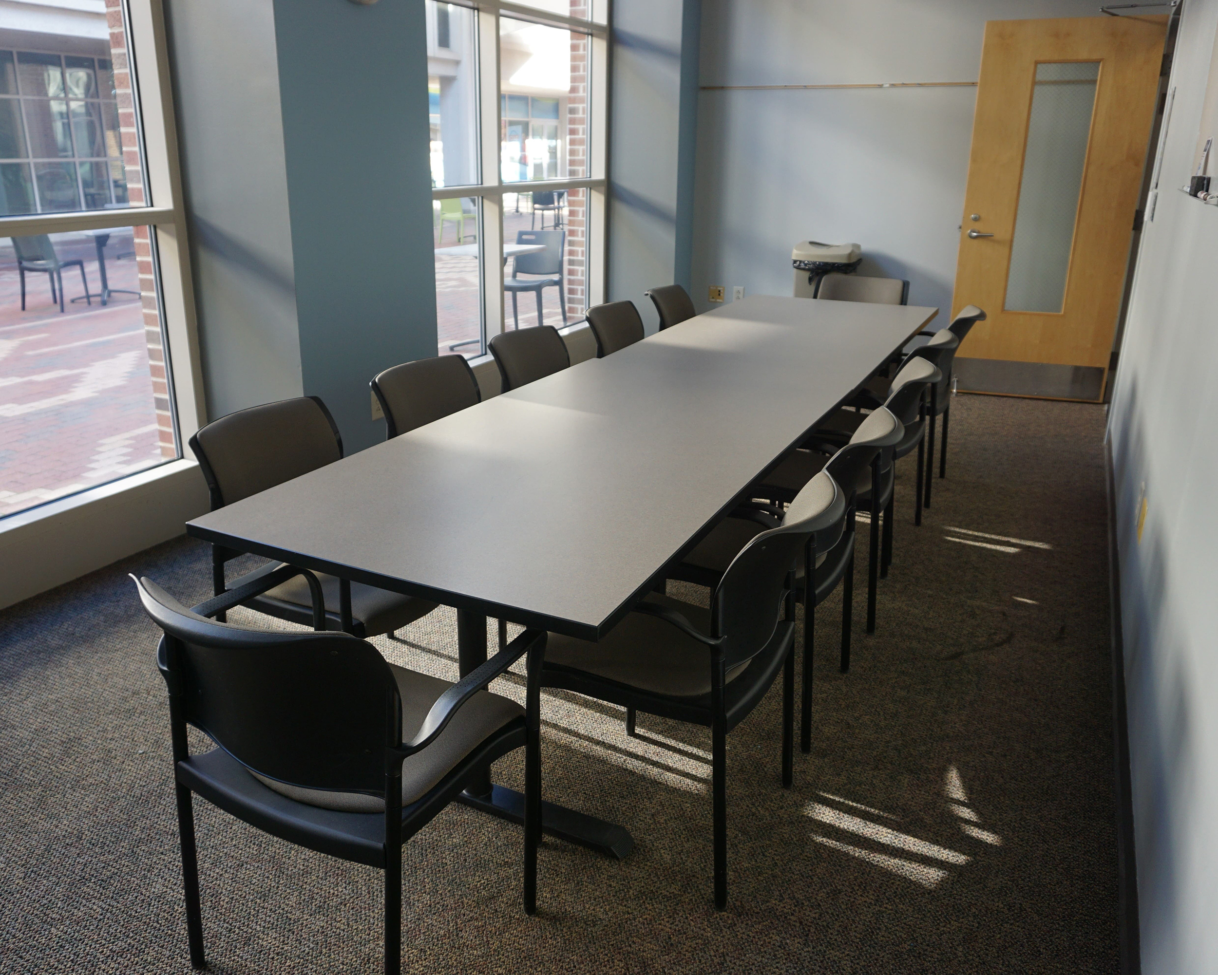 Photo of Closed Conference style setup for capacity of 12.