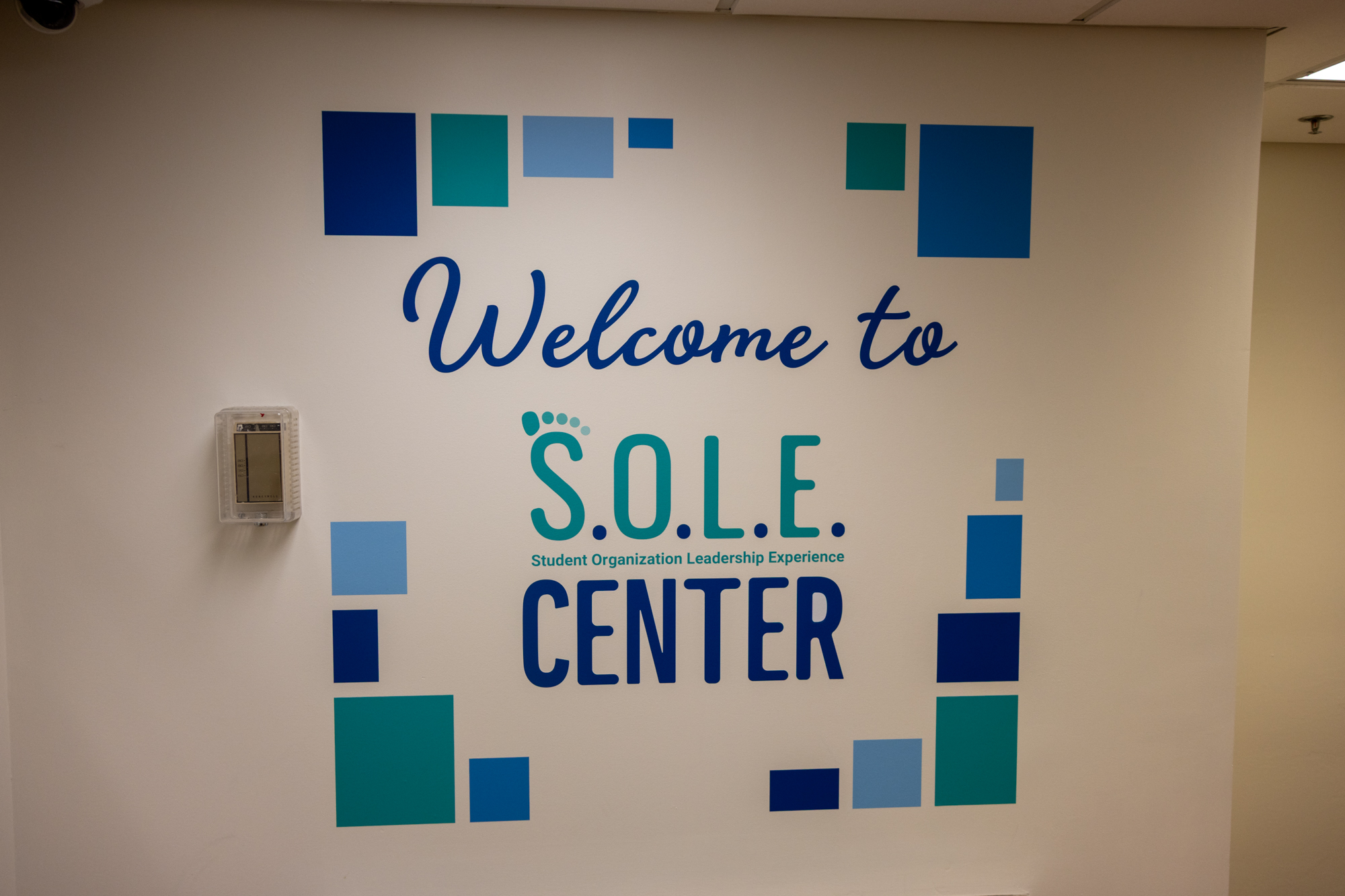 Welcome to the S.O.L.E. Center vinyl graphic within the Center's space.